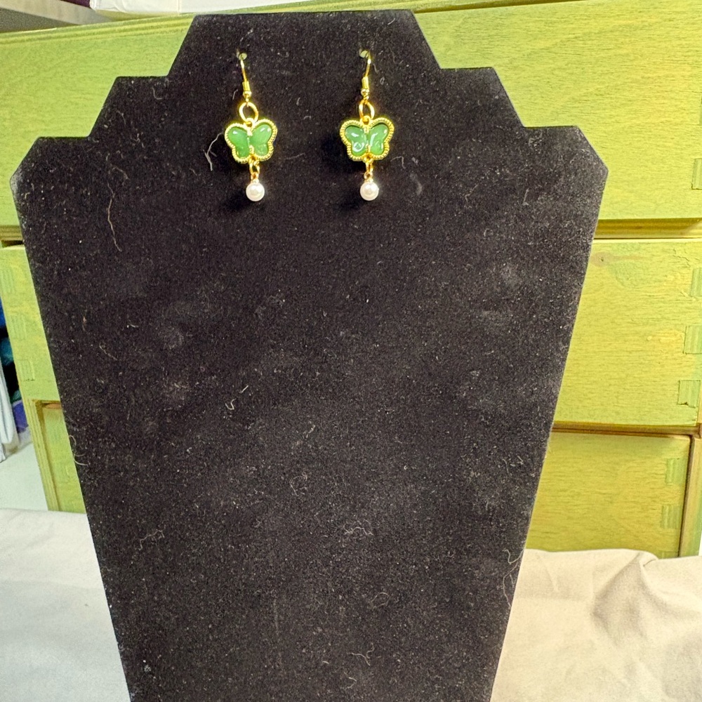 Green butterfly and faux pearl earrings